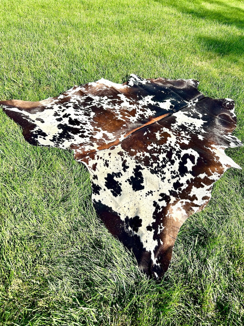 Tapis en peau de vache tricolore